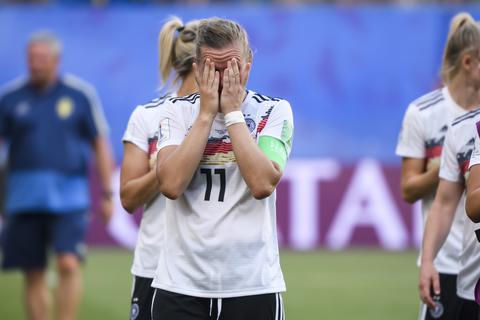 Enttäuscht nach dem WM-Aus: Alexandra Popp und ihr Teamkolleginnen. Foto: dpa